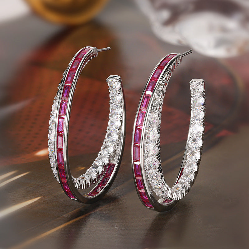 Boucles d’oreilles à tige en argent de style européen et américain avec zircon, luxe discret et allure haut de gamme.