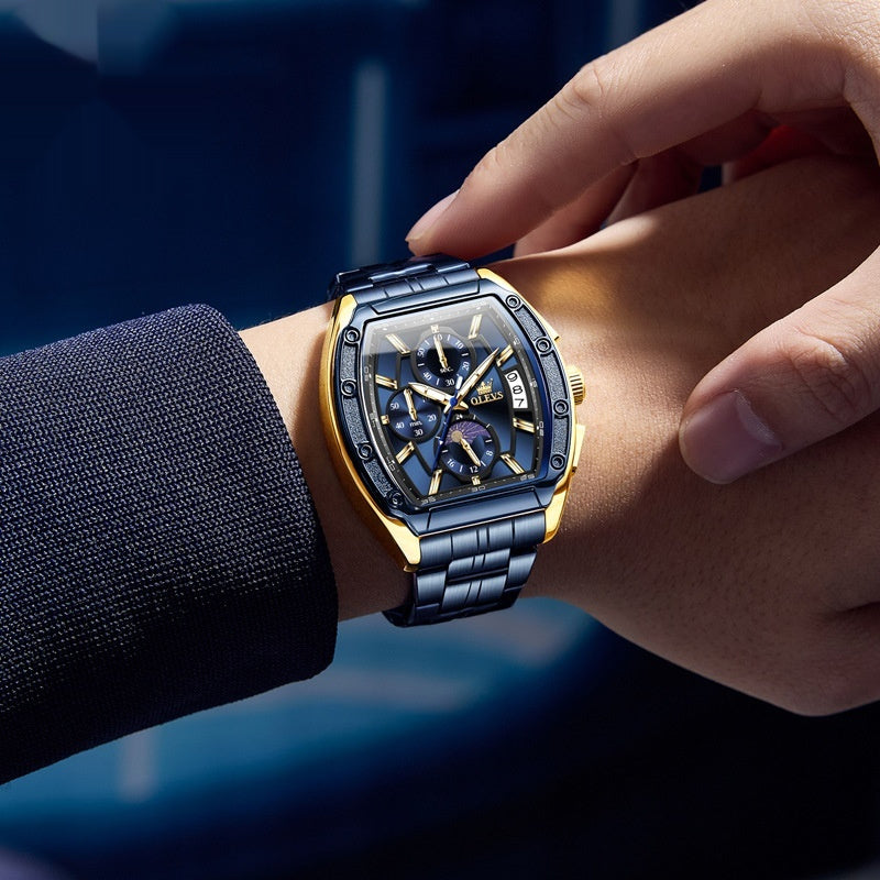 Montre homme à quartz, lumineuse, boîtier tonneau avec bracelet en acier.