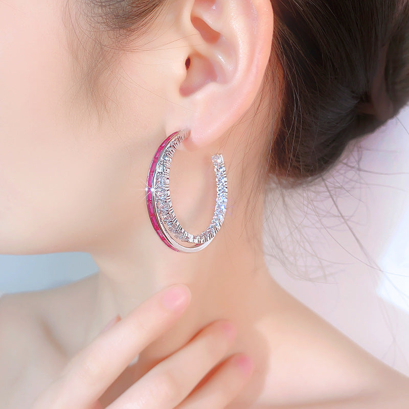 Boucles d’oreilles à tige en argent de style européen et américain avec zircon, luxe discret et allure haut de gamme.