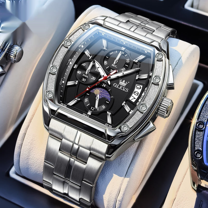 Montre homme à quartz, lumineuse, boîtier tonneau avec bracelet en acier.