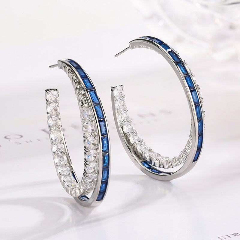 Boucles d’oreilles à tige en argent de style européen et américain avec zircon, luxe discret et allure haut de gamme.